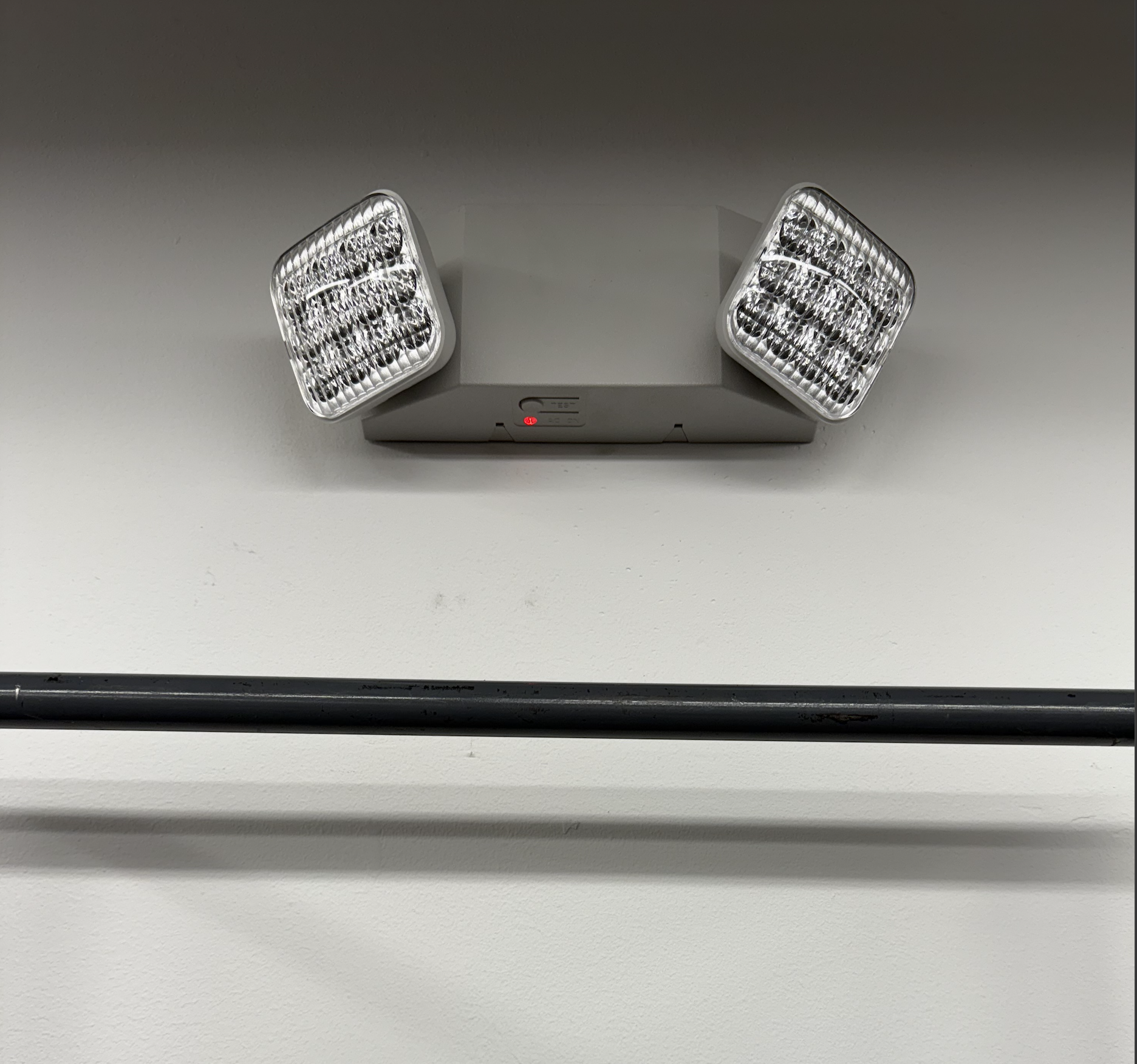 Exit and emergency light combo unit professionally mounted