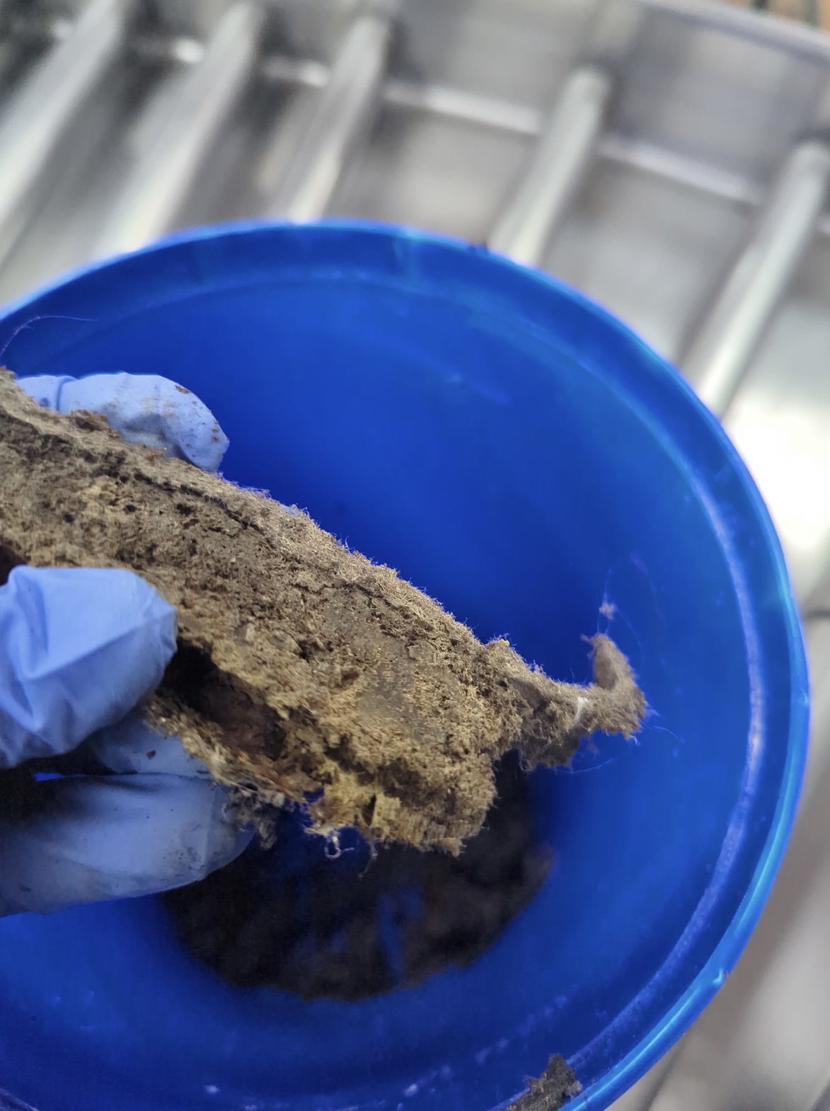 Thick grease buildup removed from kitchen exhaust - a serious fire hazard